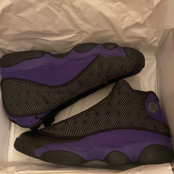 purple and black jordan 13s